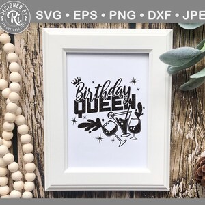 May include: A white framed print with black text that reads "Birthday Queen" with a crown above the word "Birthday" and a graphic of three martini glasses with a splash of liquid coming from one of the glasses.