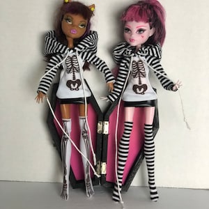 Hoodie dress for the petite slimline doll. This is an 11&quot; slimline doll.