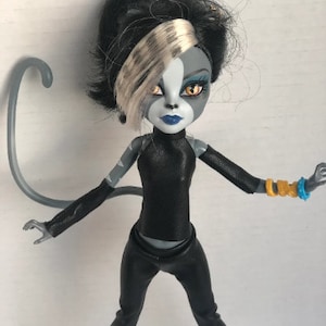 Leather outfit will be for a petite slimline doll. This is 11" doll. G1