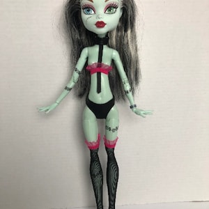 Lingerie outfit will fit 17 inches petite slimline doll.