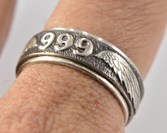 Angel number 999 spinning silver ring