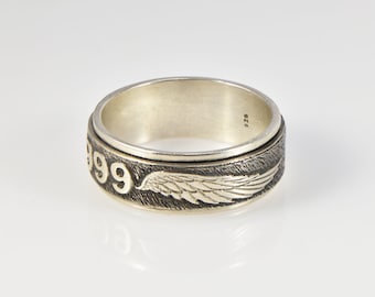 Angel number 999 spinning silver ring