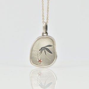 Mosquito fossil necklace in sterling silver