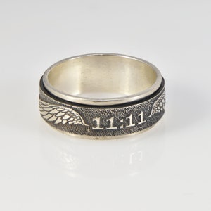 Angel number 11:11 spinning silver ring