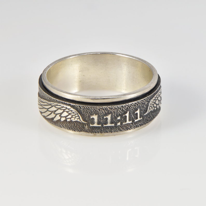 Angel number 11:11 spinning silver ring image 1