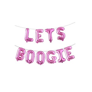May include: A set of pink foil letter balloons arranged on two thin strings to spell out the phrase LETS BOOGIE. Each individual balloon has a metallic finish and is shaped like a capital letter, creating a decorative banner for events.