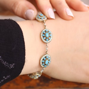 Premium Photo  Turkish bracelet and ring in a girls hand