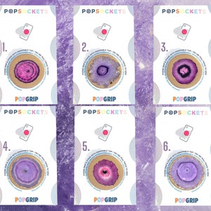 May include: Six different phone grips featuring a purple and pink agate design. Each grip has the text "POPGRIP" and "POPSOCKETS" printed on it. The grips are numbered 1 to 6.