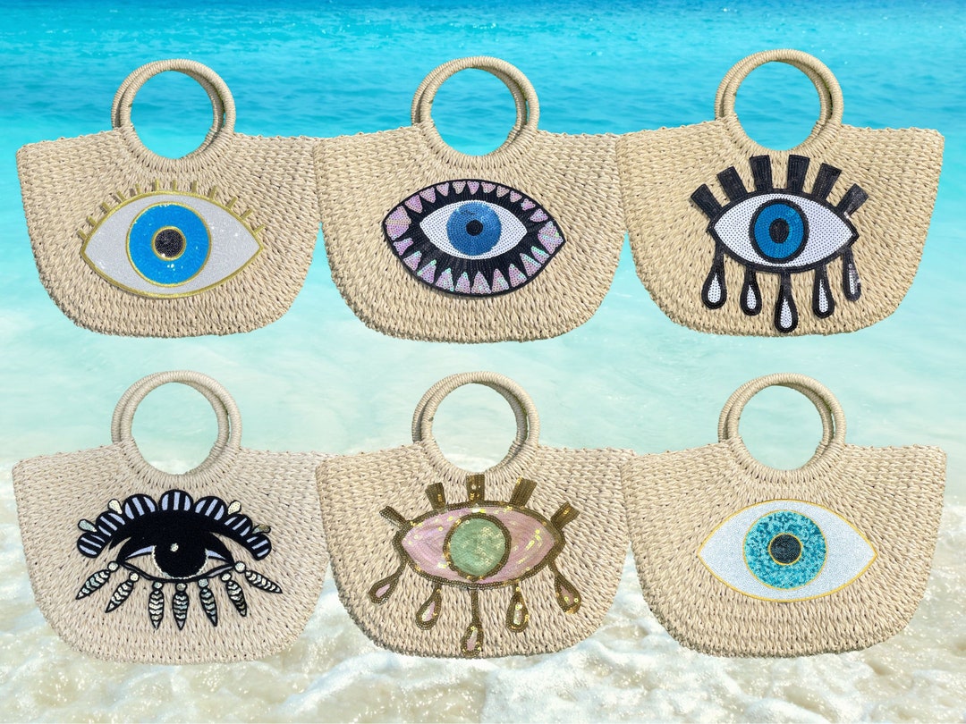 CAMELLIA EVIL EYE BAG