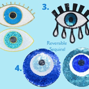 May include: Four different evil eye patches with blue, white, and black sequins. The patches are numbered 1 through 4. The patches are reversible sequins.