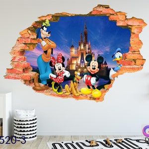 May include: A wall decal featuring Mickey Mouse, Minnie Mouse, Goofy, Pluto, and Donald Duck standing in front of Cinderella's Castle. The decal is designed to look like it is breaking through the wall. The background is a blue sky with stars.