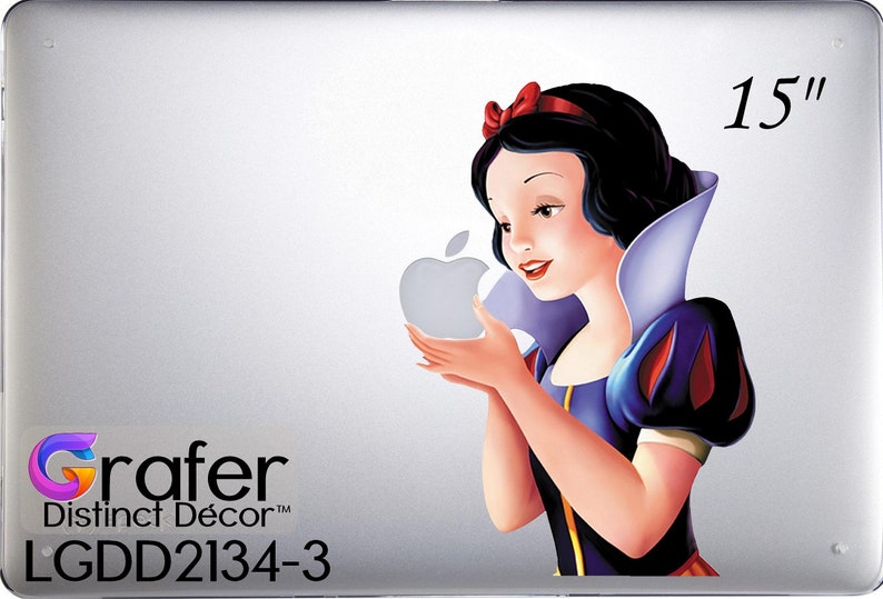 May include: A 15-inch laptop skin featuring Snow White holding a silver apple with a bite taken out of it. The skin is white with a purple and blue design. The text "Grafer Distinct D&eacute;cor&trade; LGDD2134-3" is printed on the bottom left corner of the skin.
