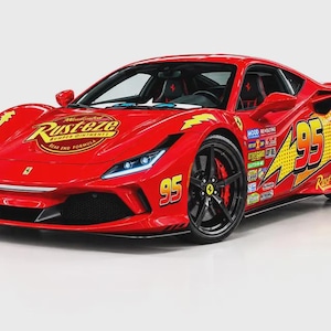 May include: A bright red sports car featuring the number 95 in yellow and red on the side and bonnet. The vehicle displays a large Rust-eze logo on the bonnet, yellow lightning bolt graphics, and various sponsor decals along the side panel.