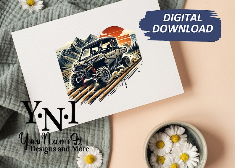 May include: A digital download of a graphic illustration of a black and gray off-road vehicle driving through a field with mountains and a sunset in the background. The vehicle has a black roll cage and a black and gray seat. The vehicle is driving on a dirt road with a field of grass on either side. The mountains are in the background and the sunset is in the sky. The text "Y.N.I. You Name It Designs and More" is at the bottom of the image.