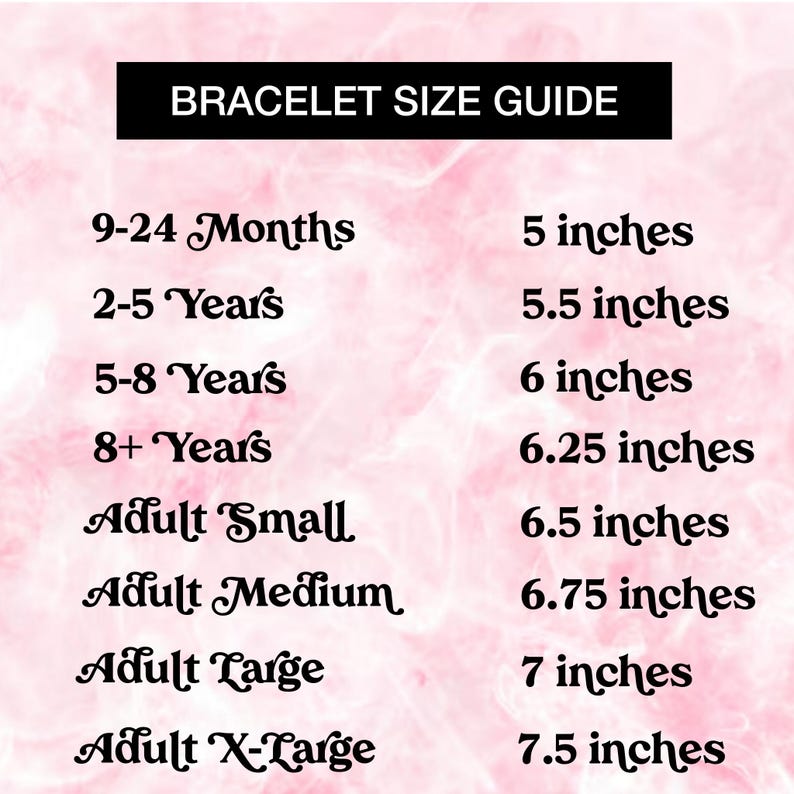May include: A bracelet size guide chart with black text on a light pink background. The chart lists sizes from 9-24 Months at 5 inches up to Adult X-Large at 7.5 inches, providing specific measurements in inches for various age groups and adult sizes.