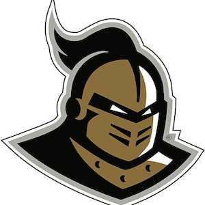 May include: A black and gold knight's head logo with a silver outline. The knight is wearing a helmet with a black visor and has a fierce expression.