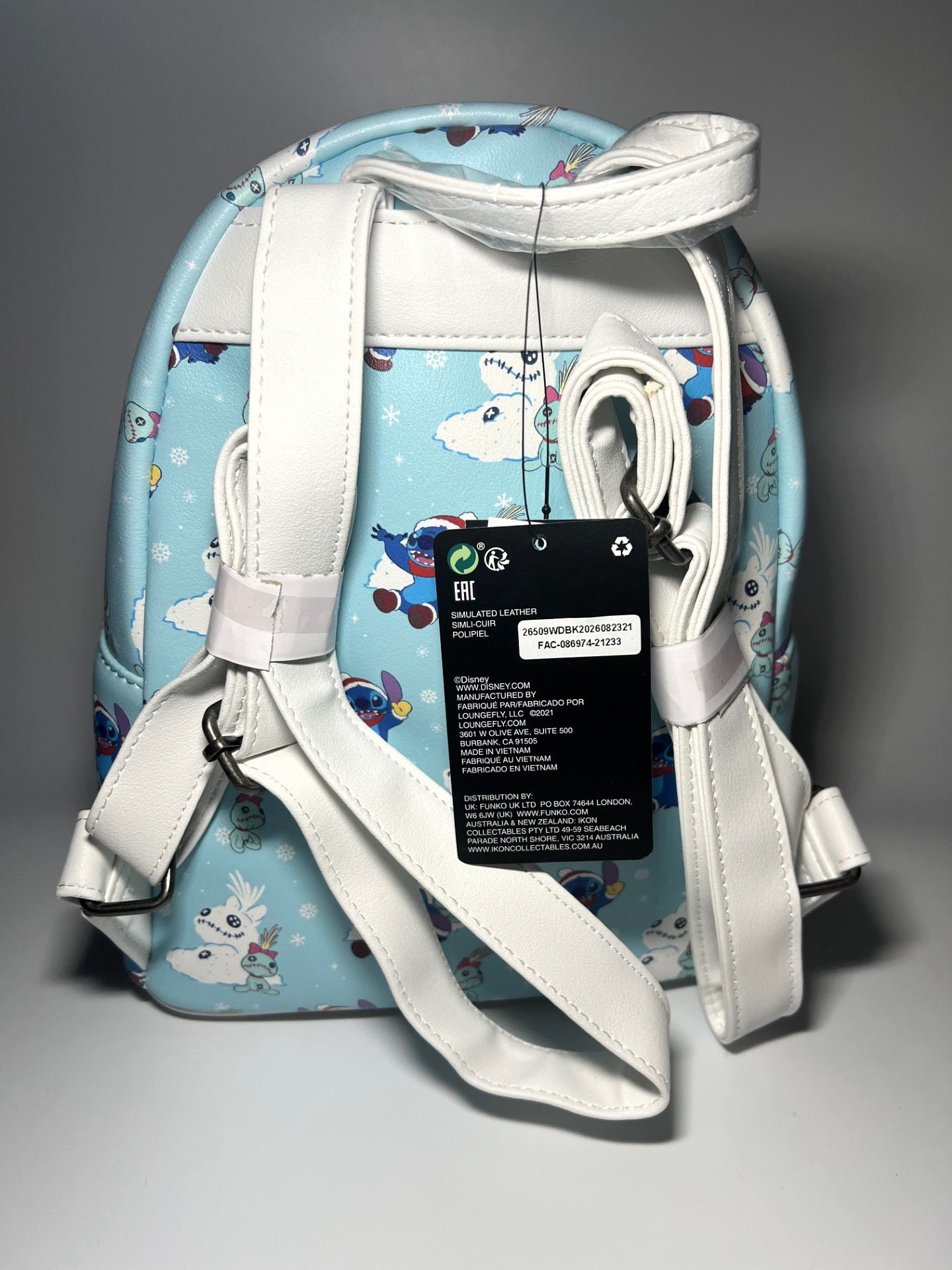 Loungefly Disney Lilo and Stitch Snow Day Mini Backpack and Wallet Amazon.com: Loungefly Lilo and Stitch Snow Cone Date Night  main image 2