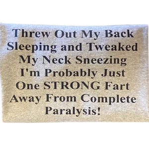 Funny Aging T-Shirt – “One Strong Fart Away from Paralysis” | Sarcastic Humor Tee