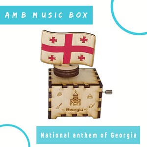 Boîte à musique hymne national de Géorgie • Cadeau rotatif en bois • Gravure de drapeau, de carte et de monuments • Détails peints à la main • Souvenir unique