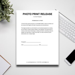 May include: A black and white photo print release form with the title "Photo Print Release" and the text "Your Name Photography" at the top. The form includes a section for the photographer, client, and date.