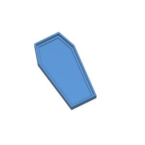 A light blue coffin-shaped lid for a planter box is shown from an overhead angle.