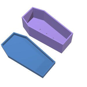 A light purple coffin-shaped planter box is shown with its light blue lid slightly ajar, both pieces viewed from above.