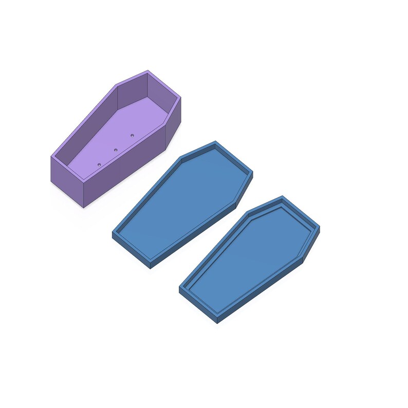 A 3D rendering showing a light purple coffin-shaped planter with drainage holes, and two separate light blue coffin-shaped trays, all on a white background.