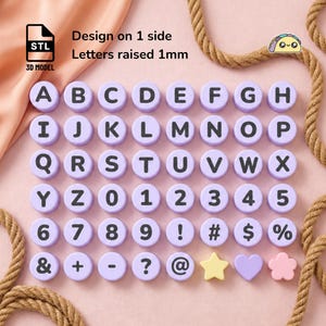 May include: A set of round, light purple beads featuring black letters, numbers, and symbols. The characters are raised by 1mm on one side. The collection includes the alphabet, digits 0-9, punctuation, and three shapes: a star, heart, and flower.