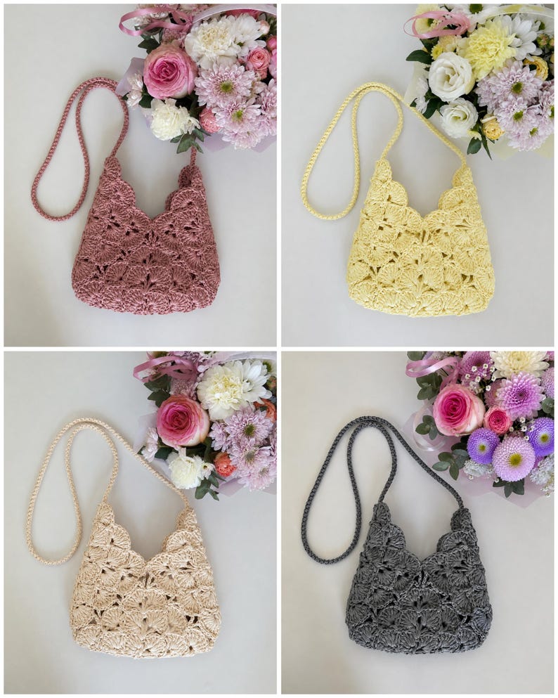 May include: A set of four crochet crossbody bags, each featuring a scalloped edge and a long braided strap. The bags are available in dusty rose, pale yellow, cream, and charcoal gray, all showcasing a detailed fan-like stitch pattern.