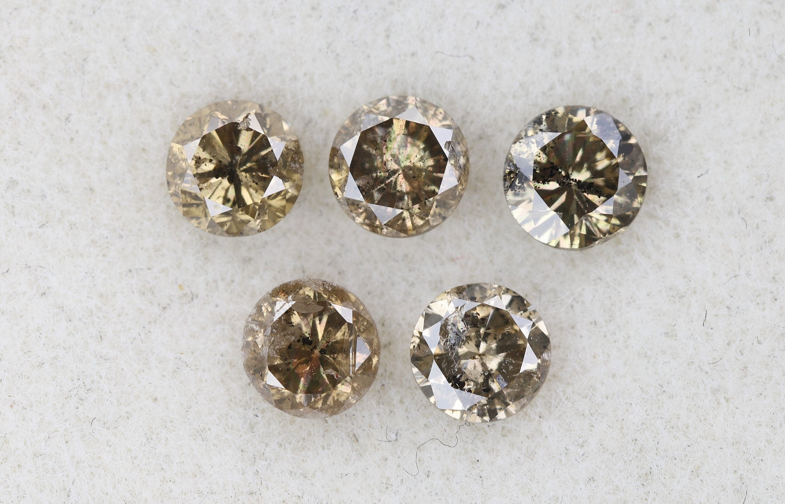 1.15 Ct, 3.8 X 2.7 MM, Round Shape Brilliant Cut Champagne Color