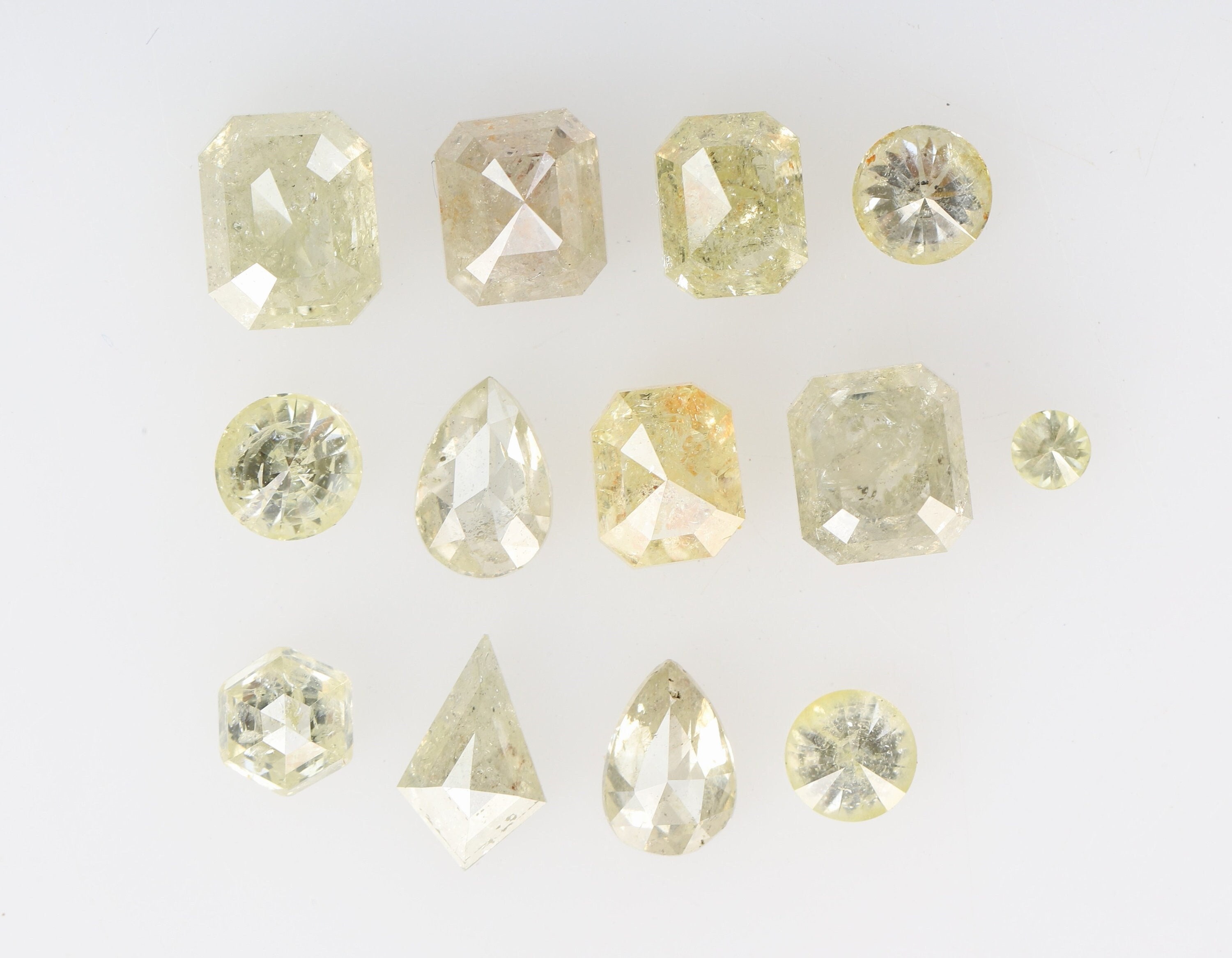 4.98 Ct, 5.4 X 4.4 X 2.9 MM, Mix Shape Fancy Light Green