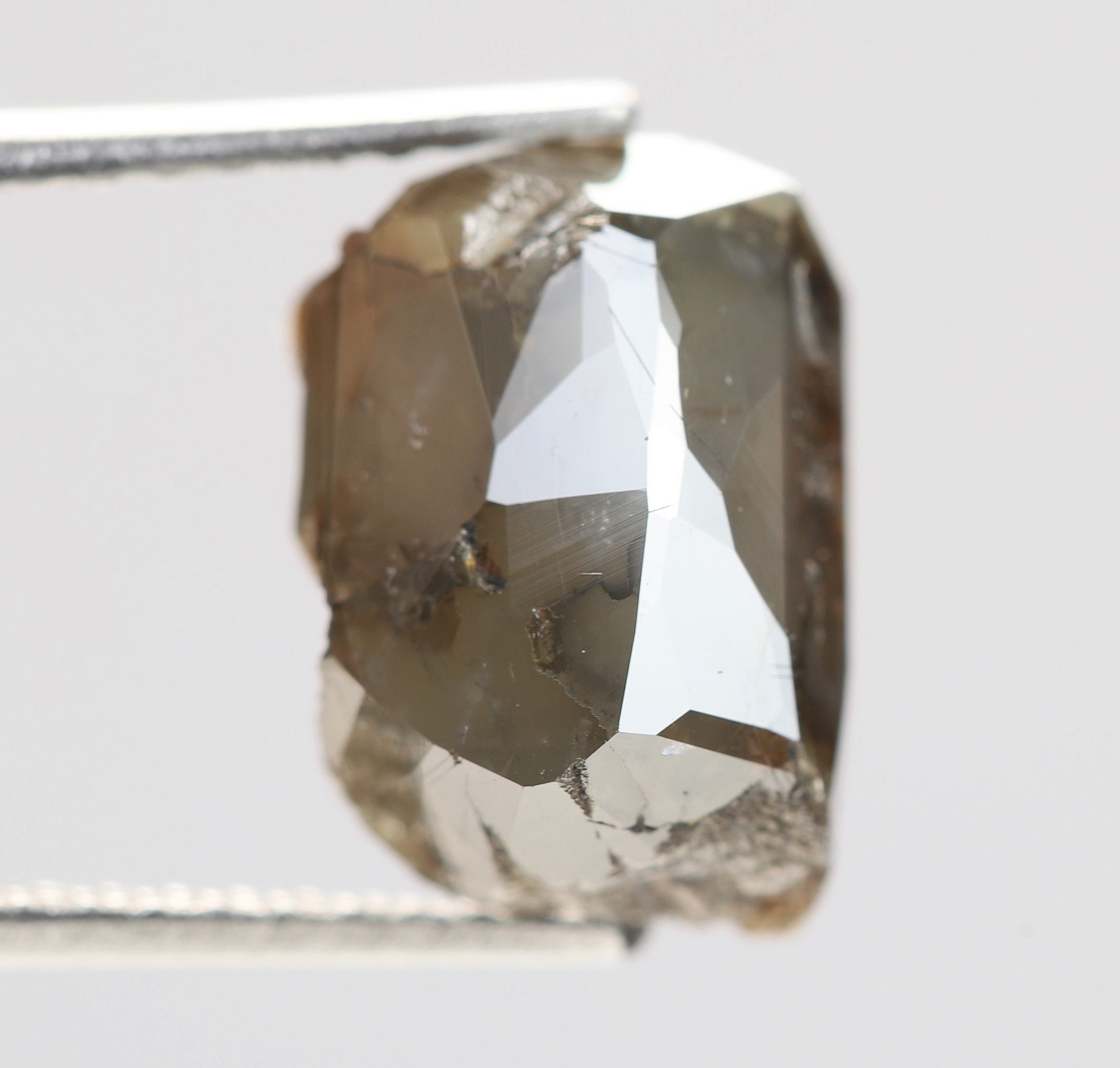3.33 Ct, 9.6 X 6.5 X 5.3 MM, Dark Green Color Raw Uncut Polished