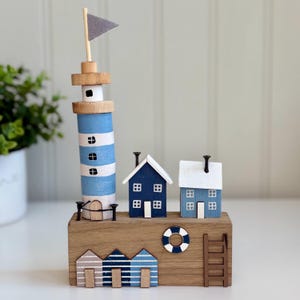 Wooden Seaside Lighthouse Scene Ornament