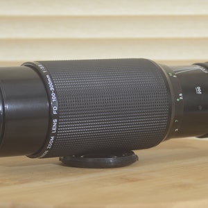 Canon 100-300mm 1:5.6 zoom lens. This is a fantastic bit of glass! You won’t be disappointed with the results, a great addition to your kit.