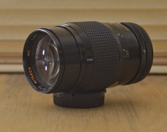 Gorgeous Mitakon MC 200mm f3.5 FD lens. Lovely macro setting, perfect for wildlife photography. Cleaned and Tested.A lovely add to your kit.