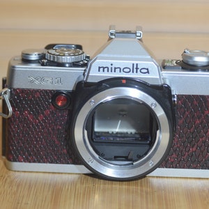 Minolta XG-1 camera with custom leatherette. Fantastic Starter Camera