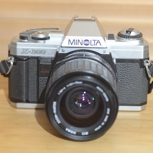 Vintage Minolta X-300 35mm Camera with Sigma 35-70mm f2.8-4 lens. Fantastic beginner camera