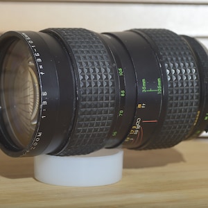Makinon Minolta MD mount 35-105mm 3.5 lens  This is a beautiful all round lens . A stunning bit of glass