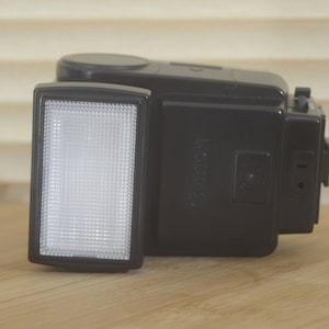 Canon 199a flash unit. Compatible with all A series Canon cameras, great flash in great condition. Fully cleaned and tested.