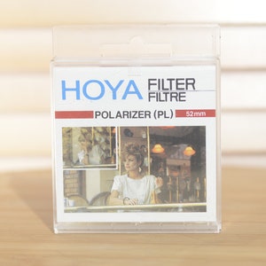 Hoya 52mm Polarising filter in Original case. Perfect for reducing glare.