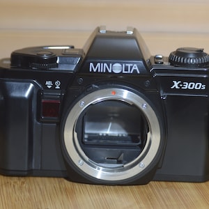 Vintage Black Minolta X-300s 35mm SLR Camera.