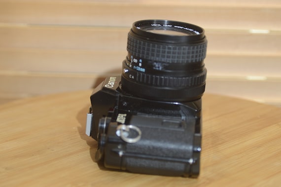 Appareil Photo Canon AV-1 35 Mm – Noir Avec Objectif 100 Mm F/1,28 – Made In Japan