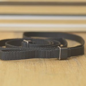 Black Camera Strap. A lovely addition to your vintage set up.