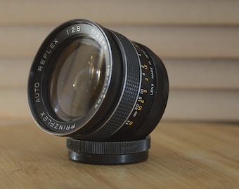 Prinzflex Auto Reflex 28mm f2.8 M42 Wide Angle Lens With Case.