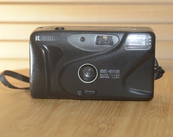 Vintage Ricoh SK 222 35mm Point and Shoot Camera with Wrist Strap.