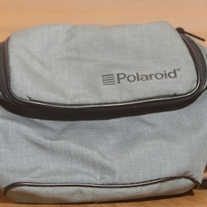Vintage Blue Polaroid Camera Bag with padded leather shoulder strap. Great little satchel