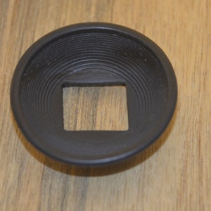 Canon Black circular eye cup. Great condition. Perfect for that little extra comfort.