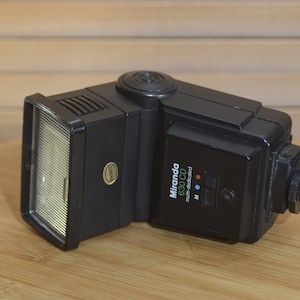 Miranda 630 CD flash unit, multi dedicated tilt and defuse settings.  With auto auto mode and manual settings.
