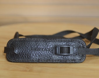 Black Leather Pentax strap. Lovely addition to your Pentax set up.