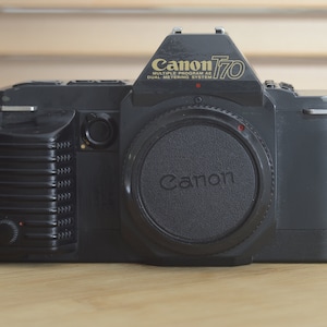 Stunning Canon T70 35mm SLR Camera. lovely condition, cleaned and tested. feels just like a digital - It couldn&#39;t be easier!